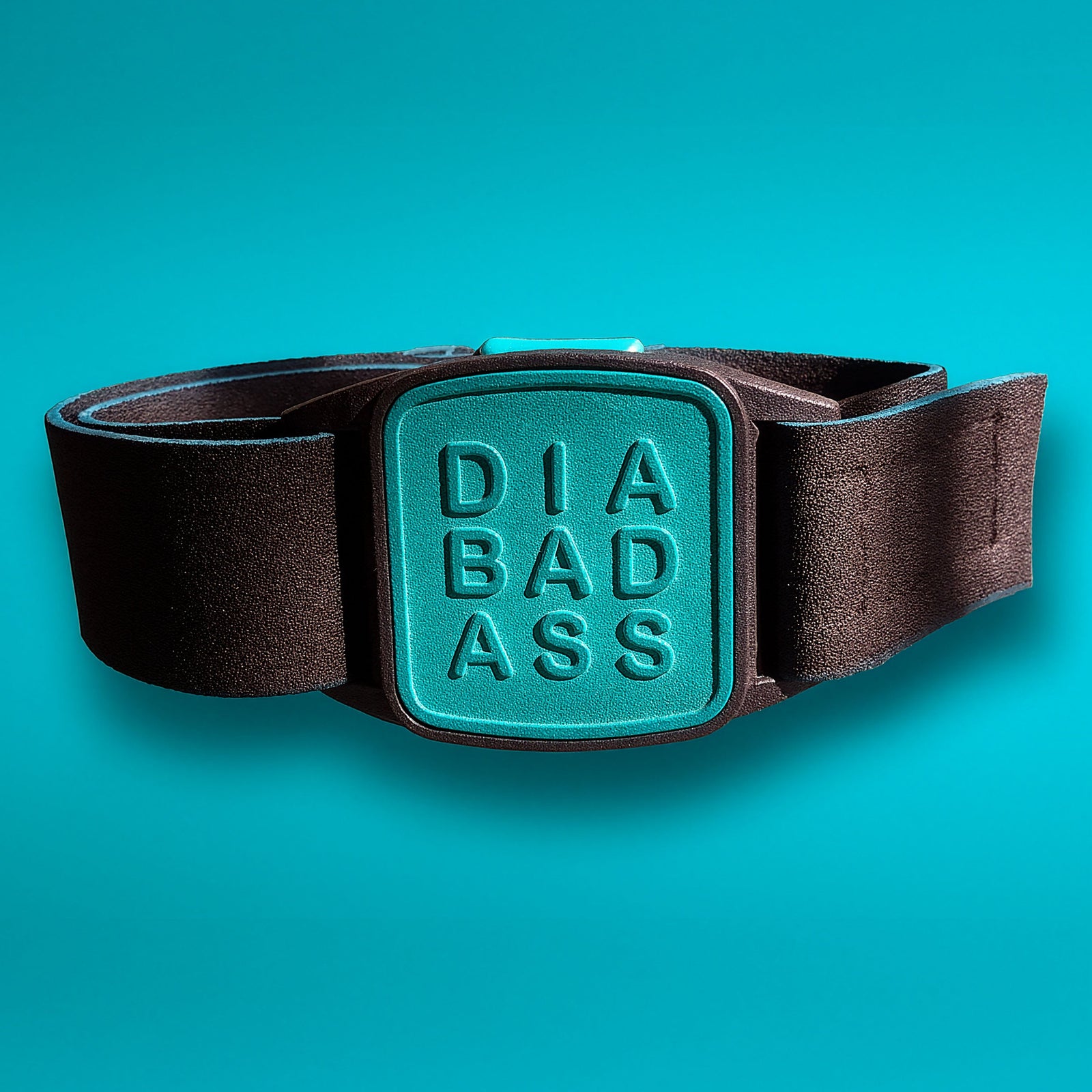 Teal DIABADASS CGM armband cover for Dexcom G7 with black neoprene strap