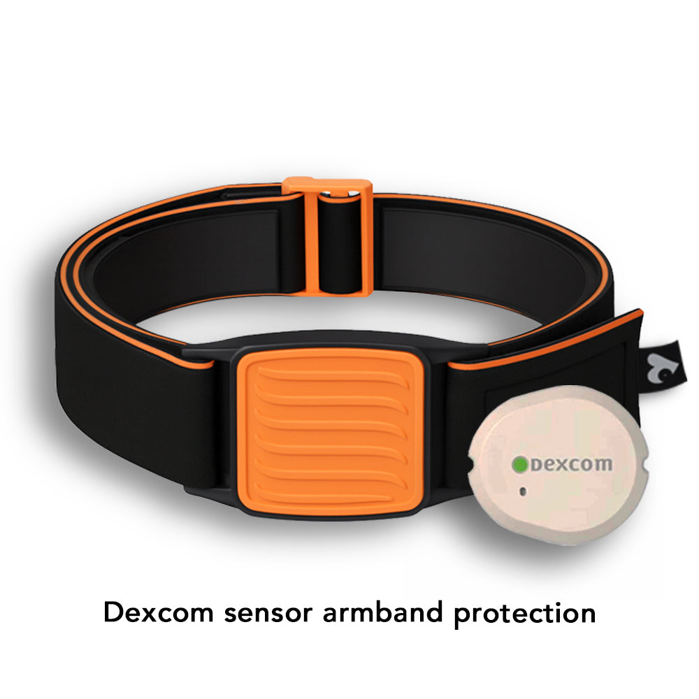 Dexband Armband for Dexcom G7, black strap with orange wave design cover. Shown next to towel with swimming pool in background.