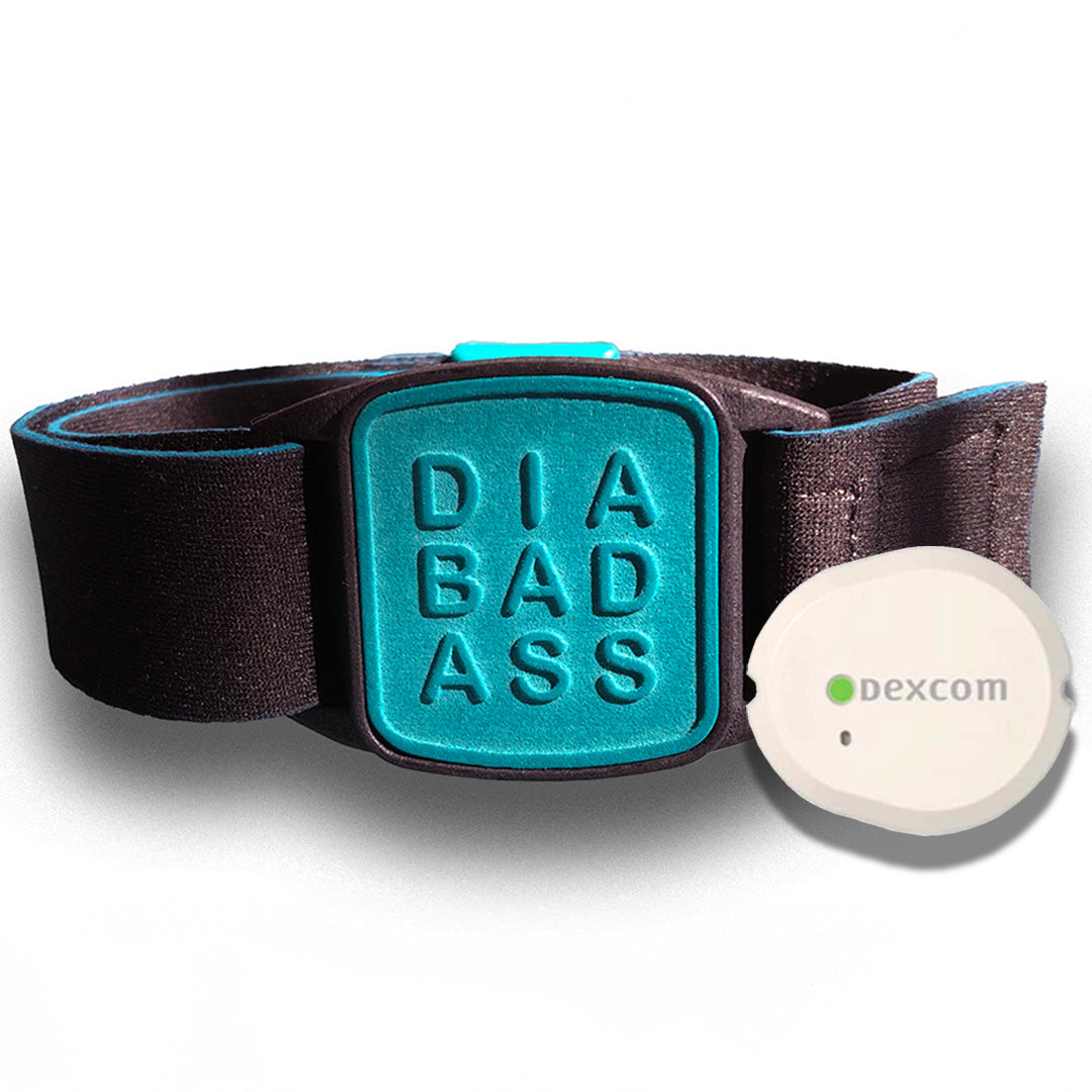 Dexband armband with black strap and teal DIABADASS cover. Shown next to swimming pool.