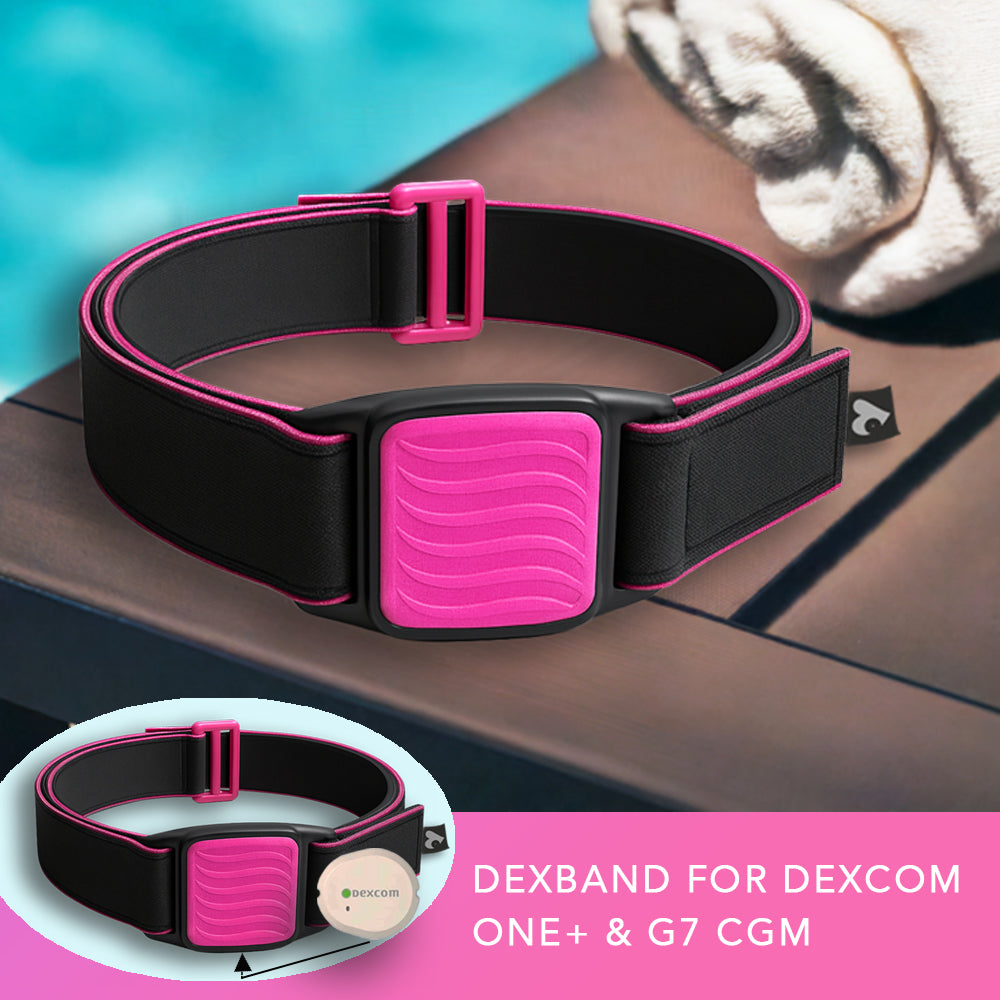 Dexband armband for Dexcom G7 CGM. Magenta cover with Wave design.  Shown on wooden table beside swimming pool.