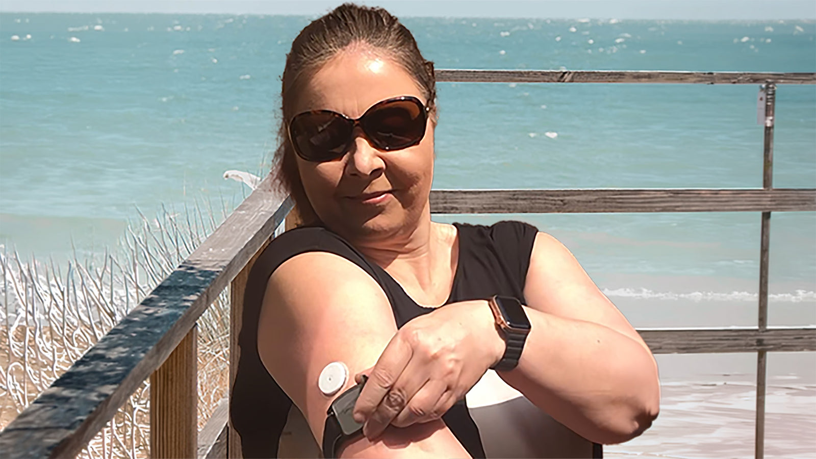 CGM armband shown on upper arm fitting with Libreband.