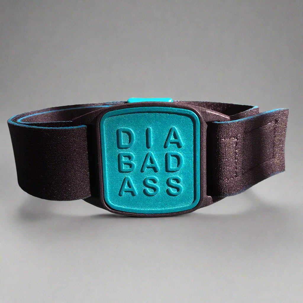 Dexband armband with black strap and teal DIABADASS cover.