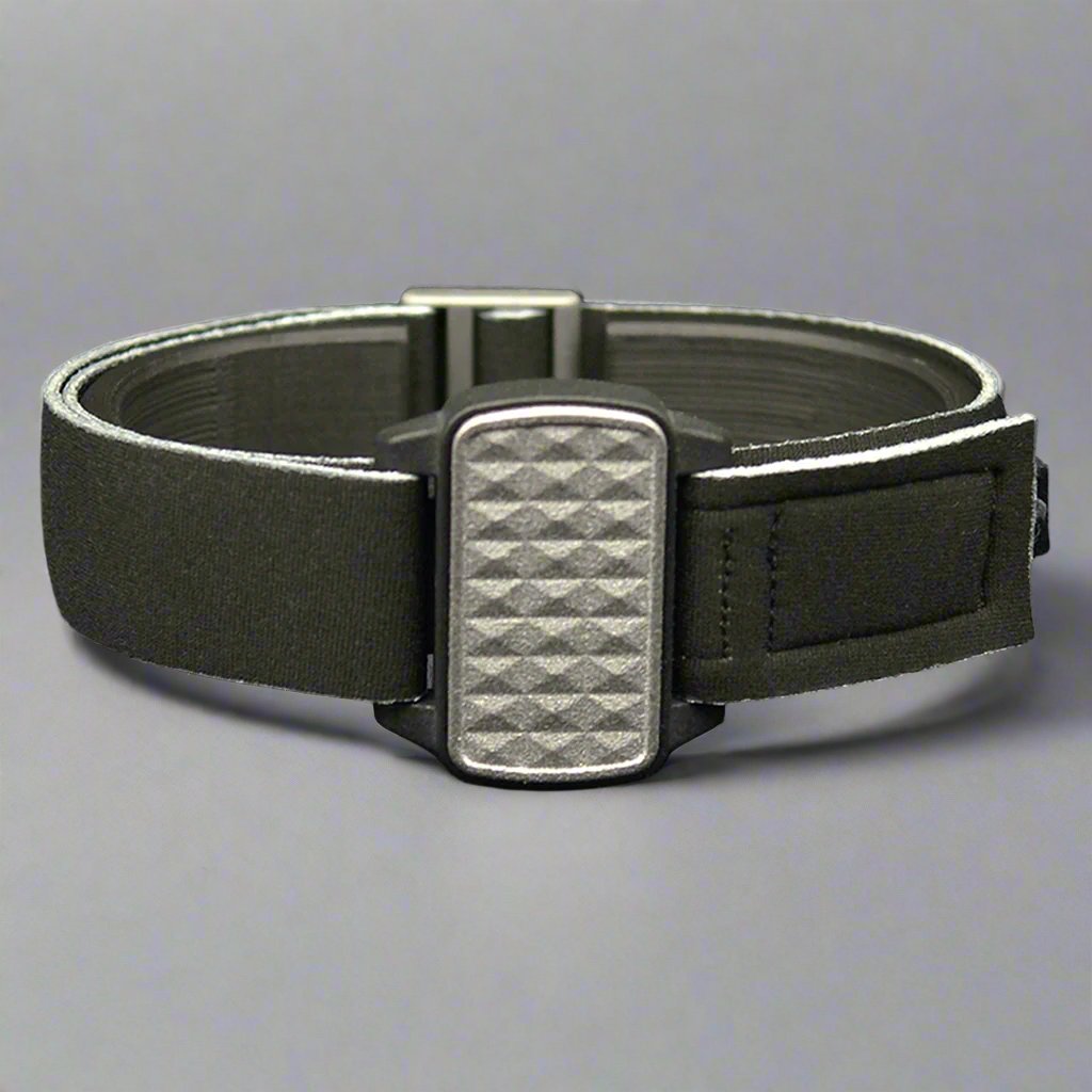 Dexband armband in pewter with pyramids cover. Black strap edged in coordinating pewter.