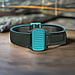 Dexband CGM armband for Dexcom G6 and ONE+ with teal wave cover and water-resistant neoprene strap in lifestyle setting