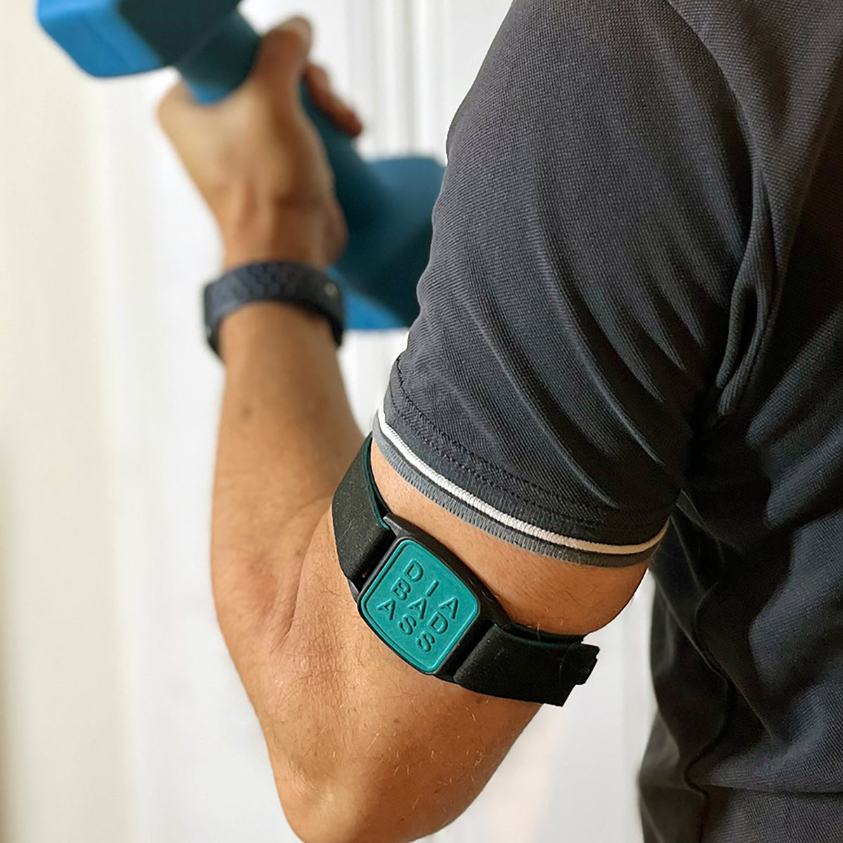 Dexband CGM armband for Dexcom G7 and ONE+ sensors with teal Diabadass cover and black neoprene strap. LML4047, LML4054, LML4061, LML5044.