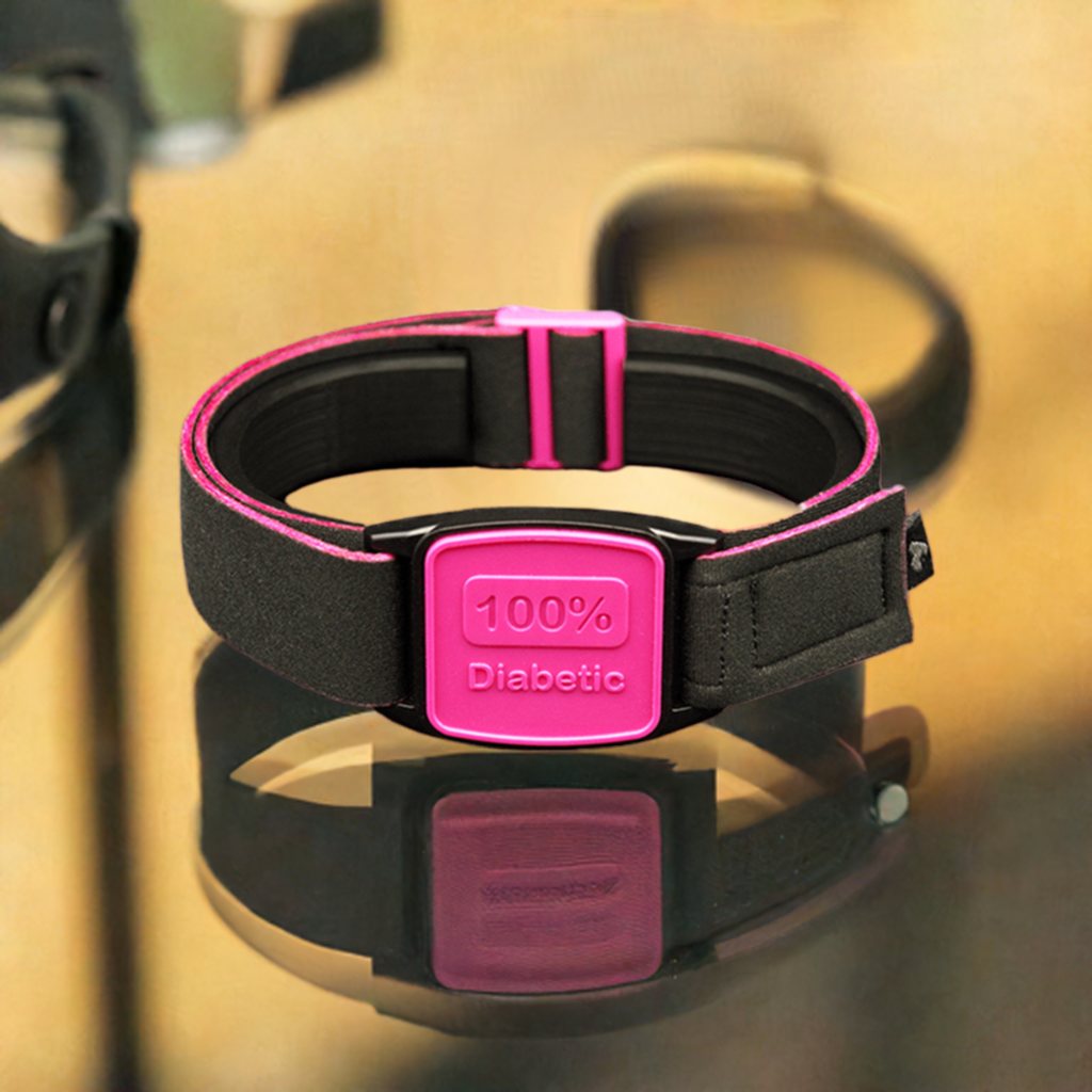 Libreband Armband for Freestyle Libre 1 &amp; 2. Magenta cover with 100% Diabetic design. Shown in jewellery shop.