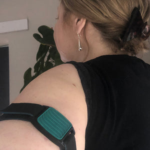 Libreband CGM armband for FreeStyle Libre 2 sensors with teal wave design and neoprene strap worn on upper arm. LML4733, LML2951, LML2456, LML2463.