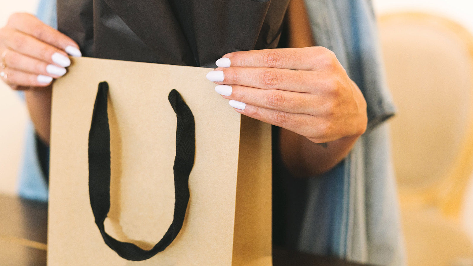 Shopping bag being held.